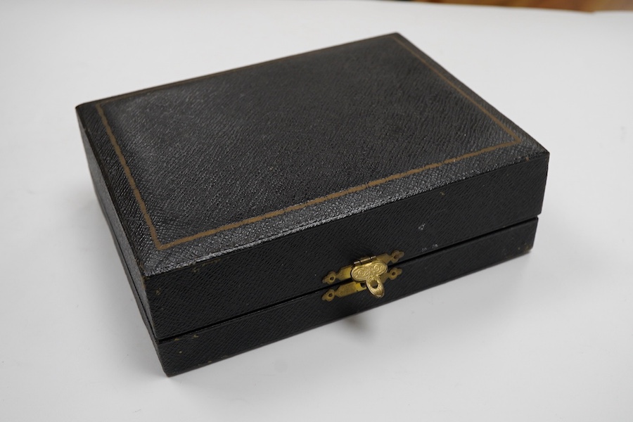 A cased set of six George V Irish silver napkin ring's, each engraved with a dear and harp on a rocky mound with tower and dated 1924, Wakely & Wheeler, Dublin, 1923.